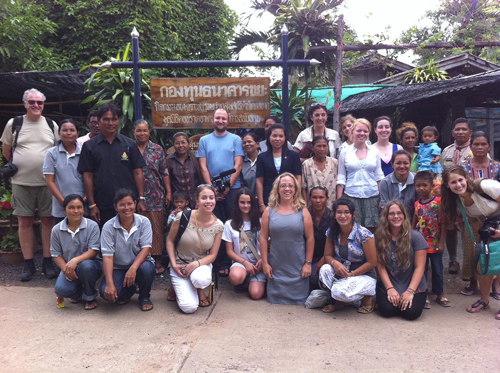 Participants of Prevent Human Trafficking's annual anti-trafficking summer study program visiting a local village in Buriram, Thailand. 